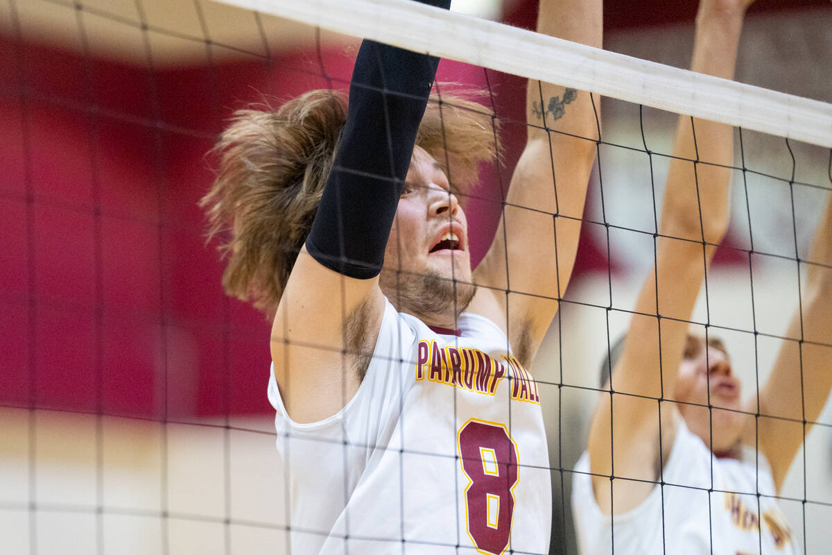 Pahrump Valley High School senior Elijah Thompson fully extends on a block attempt at the net d ...