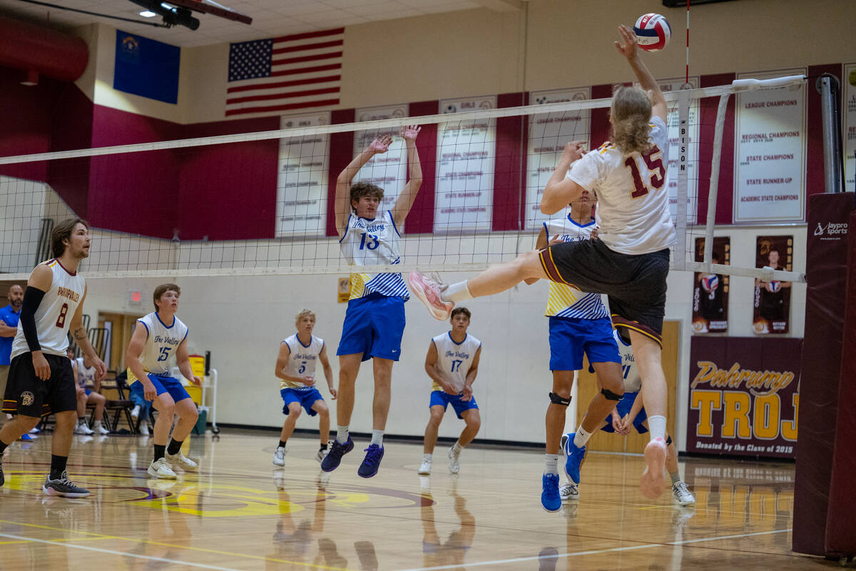 Pahrump Valley High School senior Tristan Whaley gets good placement on a ball back over the ne ...