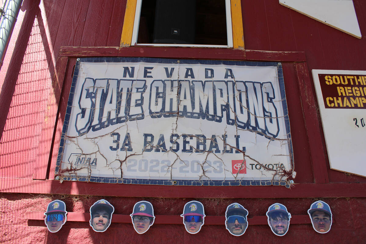 Senior headshots were cut out and pasted below the Nevada Class 3A State Championship banner fo ...