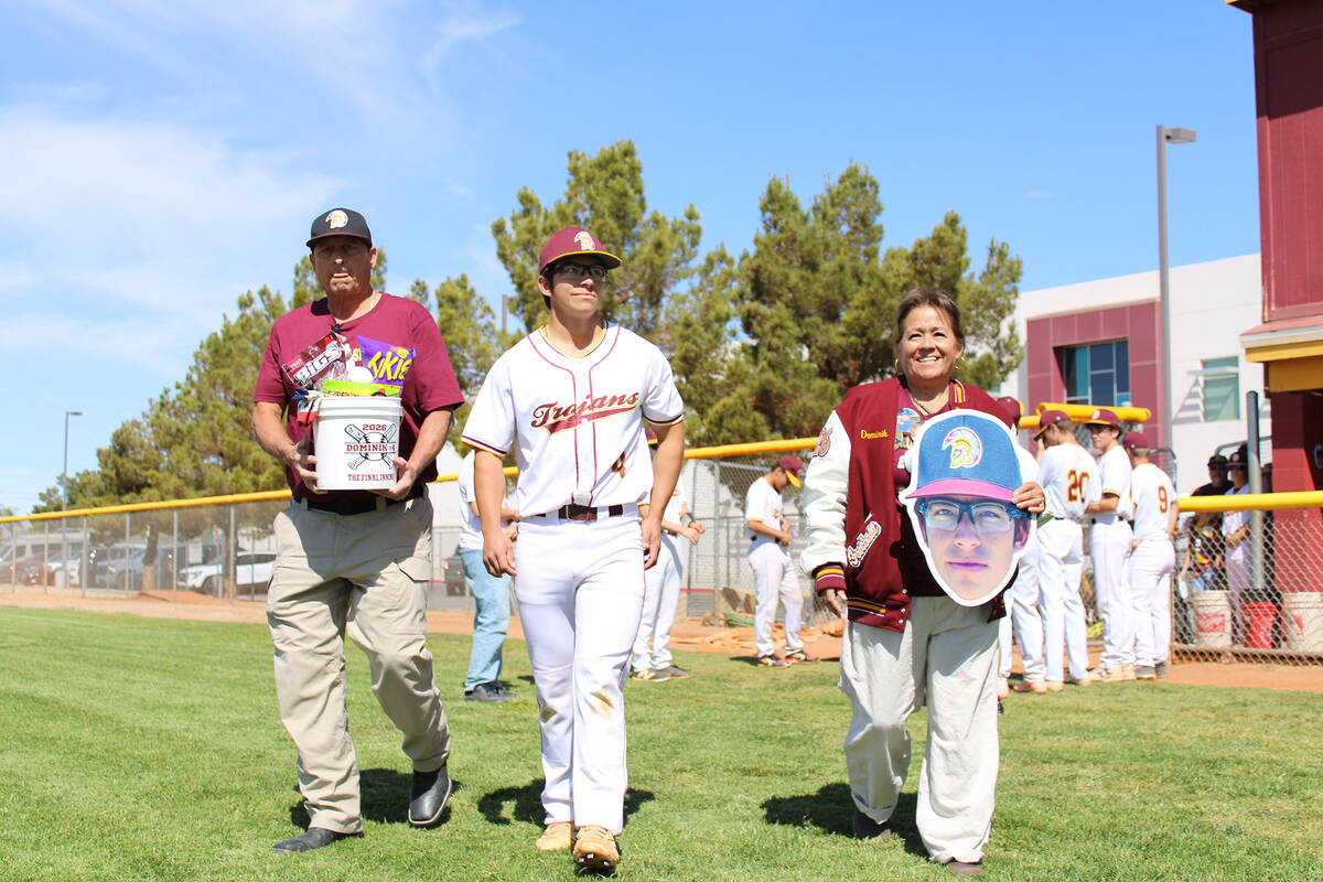 Pahrump Valley High School senior Dominik Wilson is honored before the Trojans' non-league cont ...