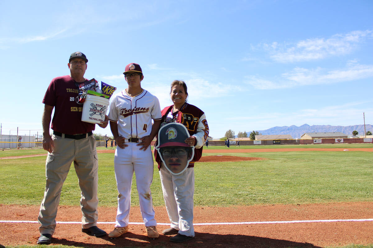Pahrump Valley High School senior Dominik Wilson is honored before the Trojans' non-league cont ...