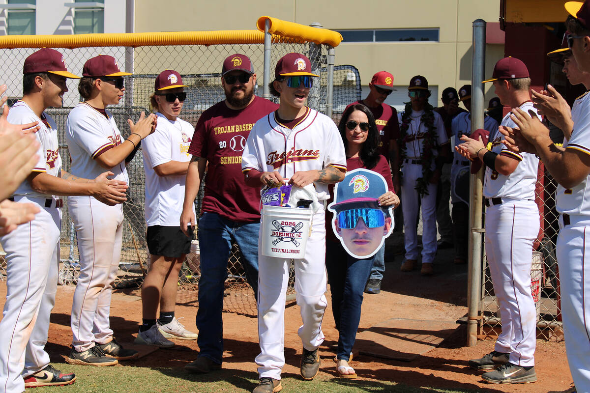 Pahrump Valley High School senior Dominic Chiancone and his family are honored before the Troja ...