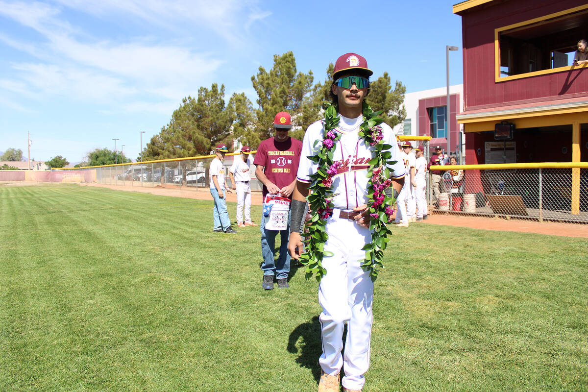 Pahrump Valley High School senior Vinny Whitney is honored before the Trojans' non-league conte ...