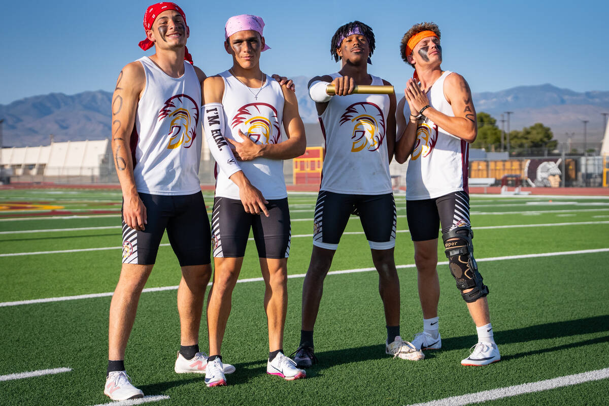 Pahrump Valley High School seniors Joshua Slusher (left), Benjamin De Santiago (middle left), J ...