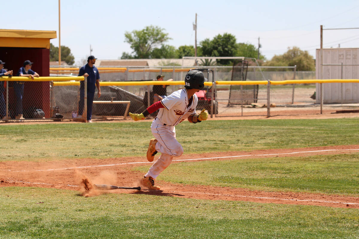 Pahrump Valley High School junior Tony Whitney hustles down the first base line during Senior D ...