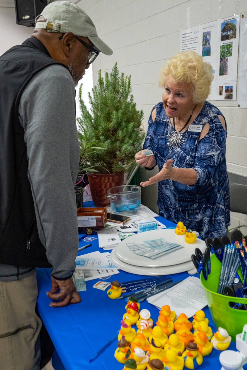 Debby Woodland of Great Basin Water Co. was on hand at the Earth/Arbor Day Celebration, providi ...