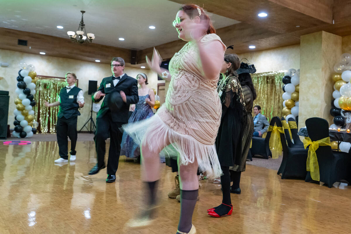 Attendees at the Great Gatsby-themed homeschool prom on Saturday, April 25, brought their 1920s ...