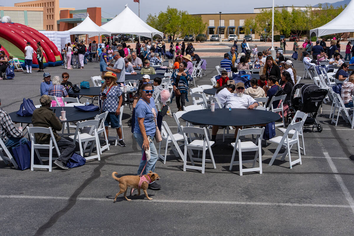The parking lot at Desert View Hospital was taken over by picnic tables, inflatable games and o ...