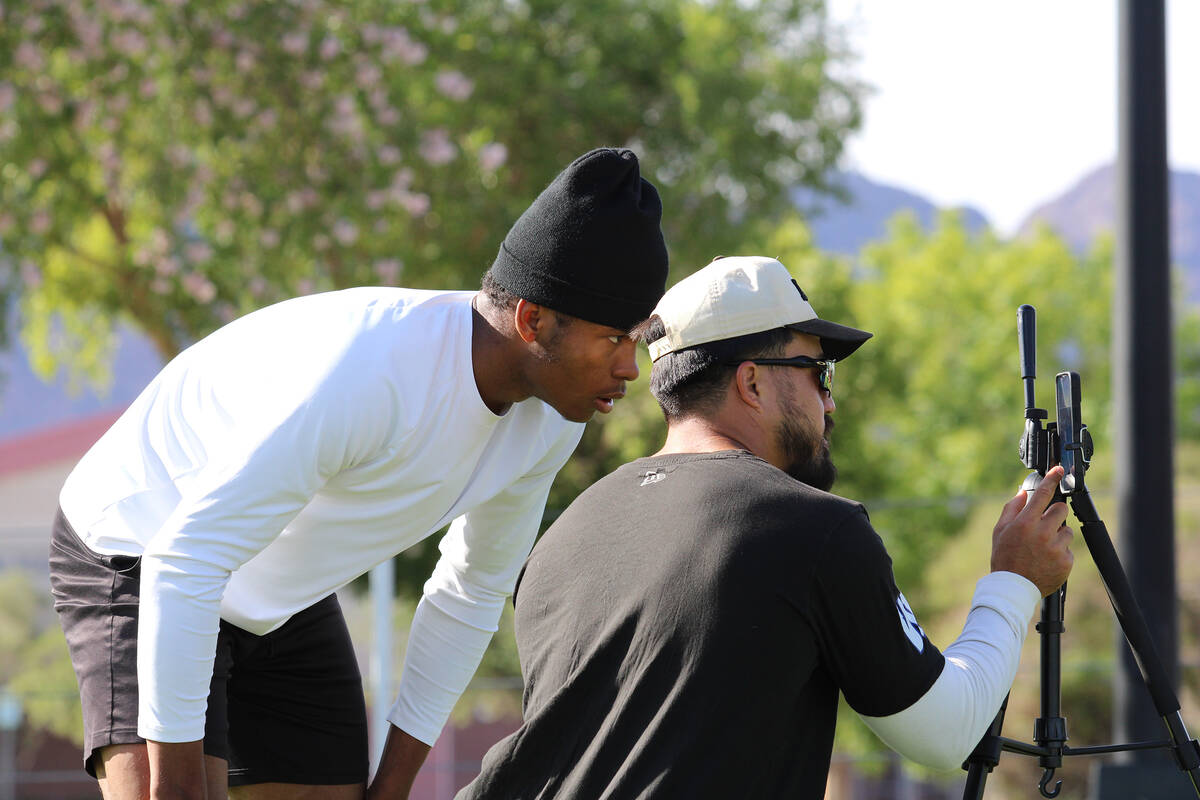 Pahrump Valley High School 3-star junior LB Iyan Bosket studies film with Les Maruo from Lineba ...