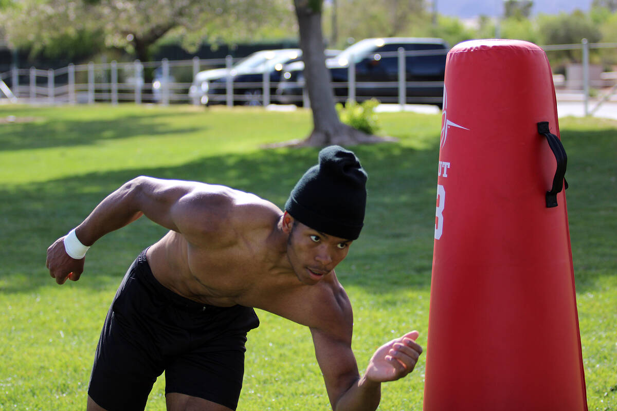 Pahrump Valley High School 3-star junior LB Iyan Bosket runs a sequence of drills with Les Maru ...