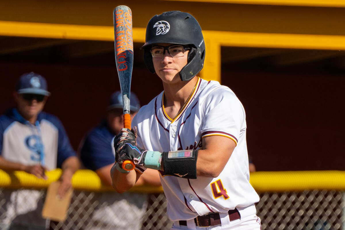 Pahrump Valley High School senior Dominik Wilson steps into the box before an at-bat during the ...