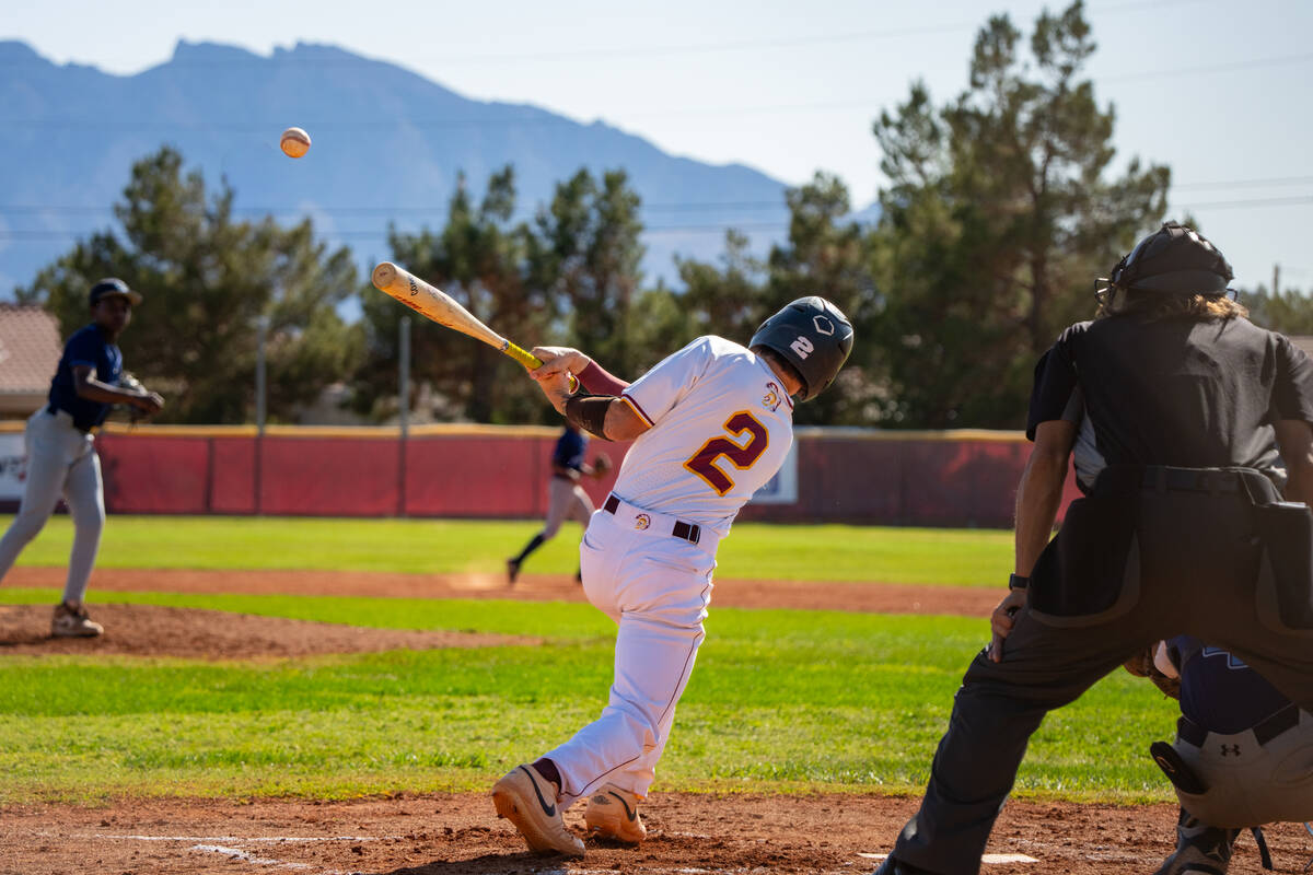 Pahrump Valley High School senior Dominic Chiancone rips a ball in play during his last home ga ...