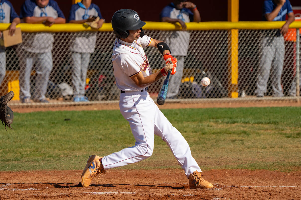 Pahrump Valley High School senior Vinny Whitney squares up a ball in his last home game as a Tr ...