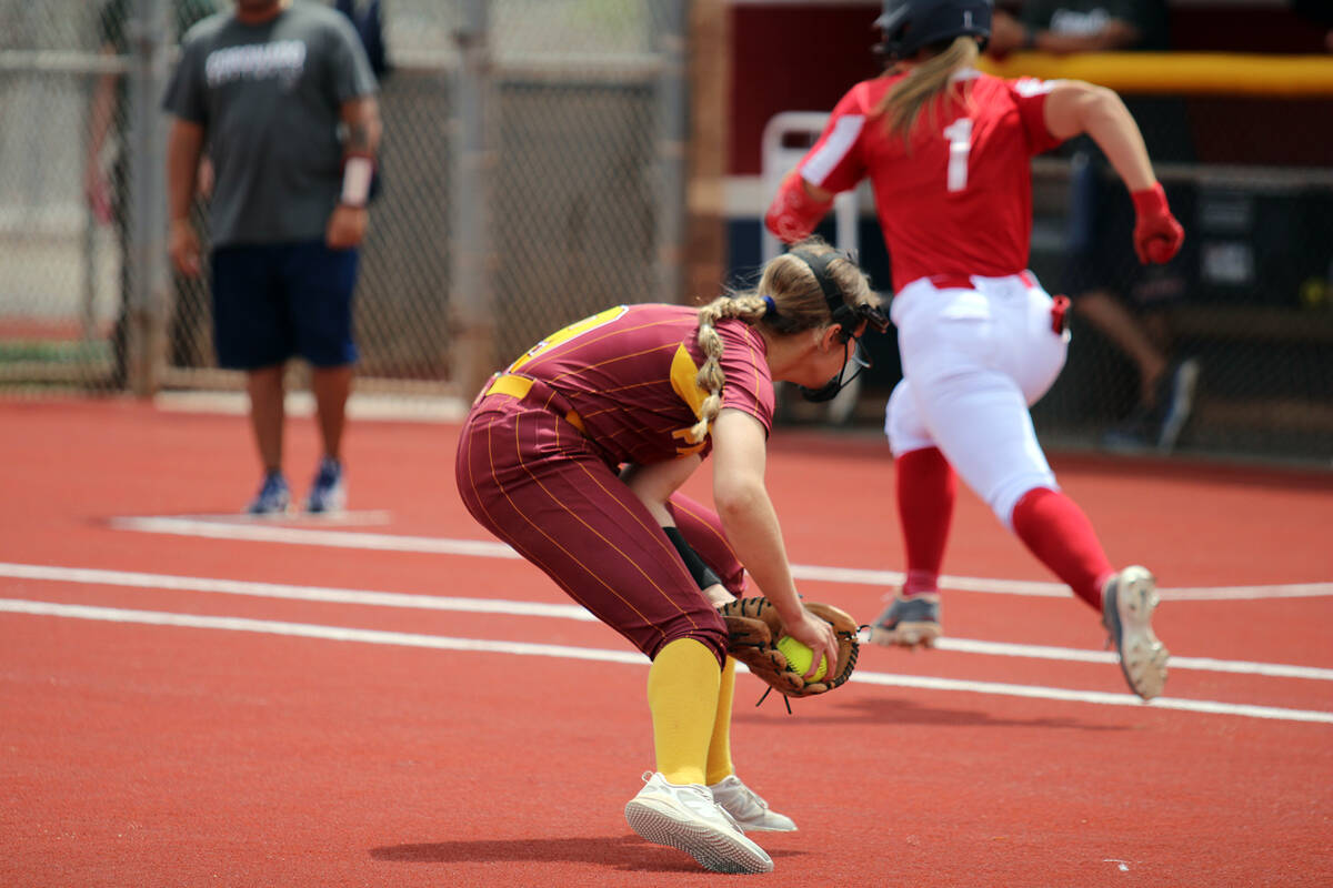 Pahrump Valley High School's starting pitcher and freshman Jaycie Hayes prepares to get rid of ...