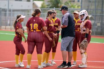 Pahrump Valley High School softball head coach Brian Hayes comes out to the circle for a mound ...