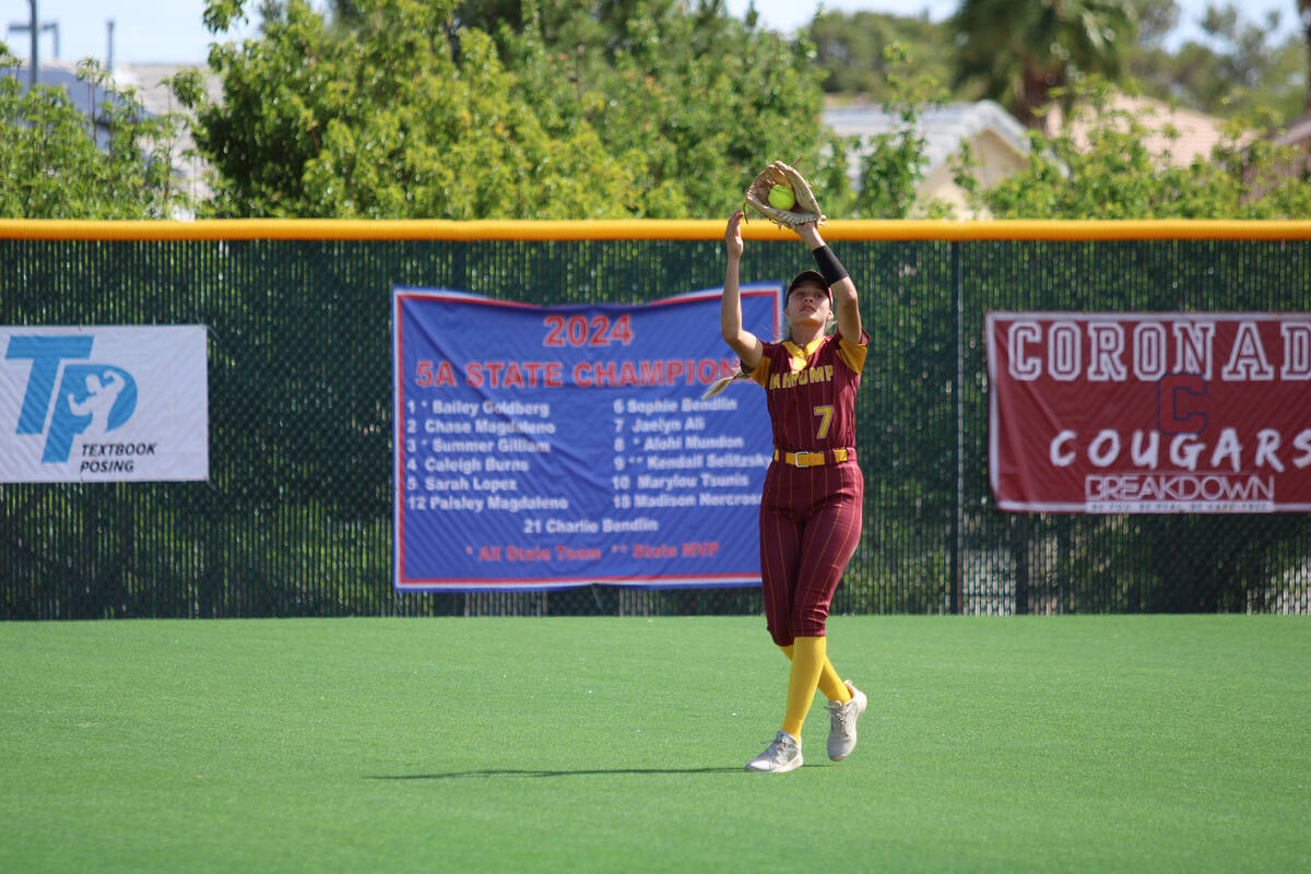 Pahrump Valley High School junior Riley Saldana secures a pop fly in the outfield against the C ...