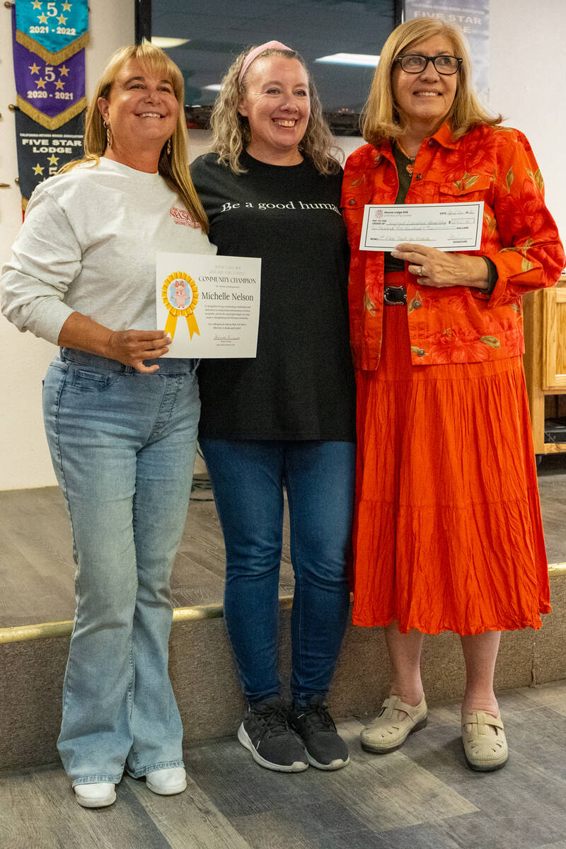 Moose Heart of the Community Chair Shannon Arimura, center, was proud to present Michelle Nelso ...