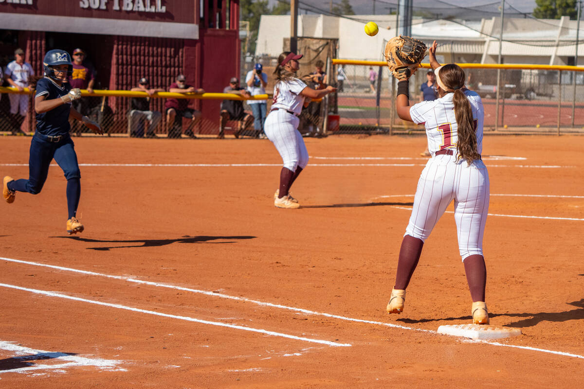 Pahrump Valley High School junior Evalenne Armendariz cleanly fields a ground ball for the out ...