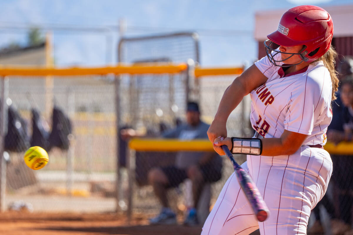 Pahrump Valley High School junior Evalenne Armendariz launches a home run over the center field ...