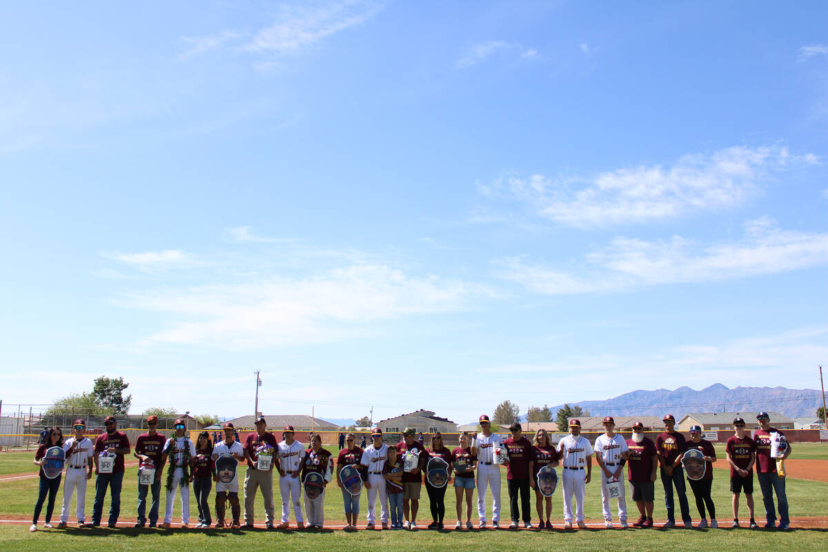 Seniors and their parents gathered on the field for Senior Day ceremonies in Pahrump on April 1 ...
