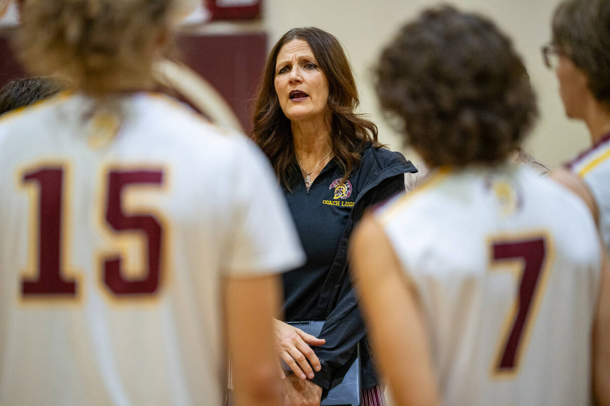 Trojans men's volleyball head coach Amber Lugo speaks to the team during a called timeout in th ...