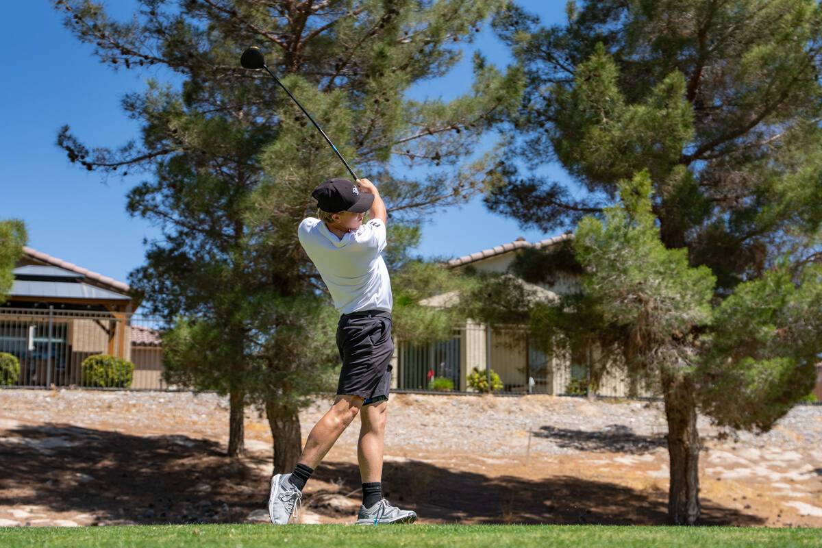 Pahrump Valley High School boys golf junior TC Hone drives a ball deep during day one of the Cl ...