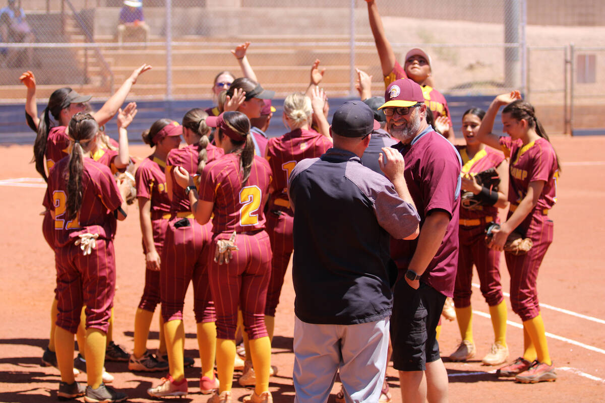 The Lady Trojans celebrate a home run from Jaycie Hayes during a playoff game against Moapa Val ...