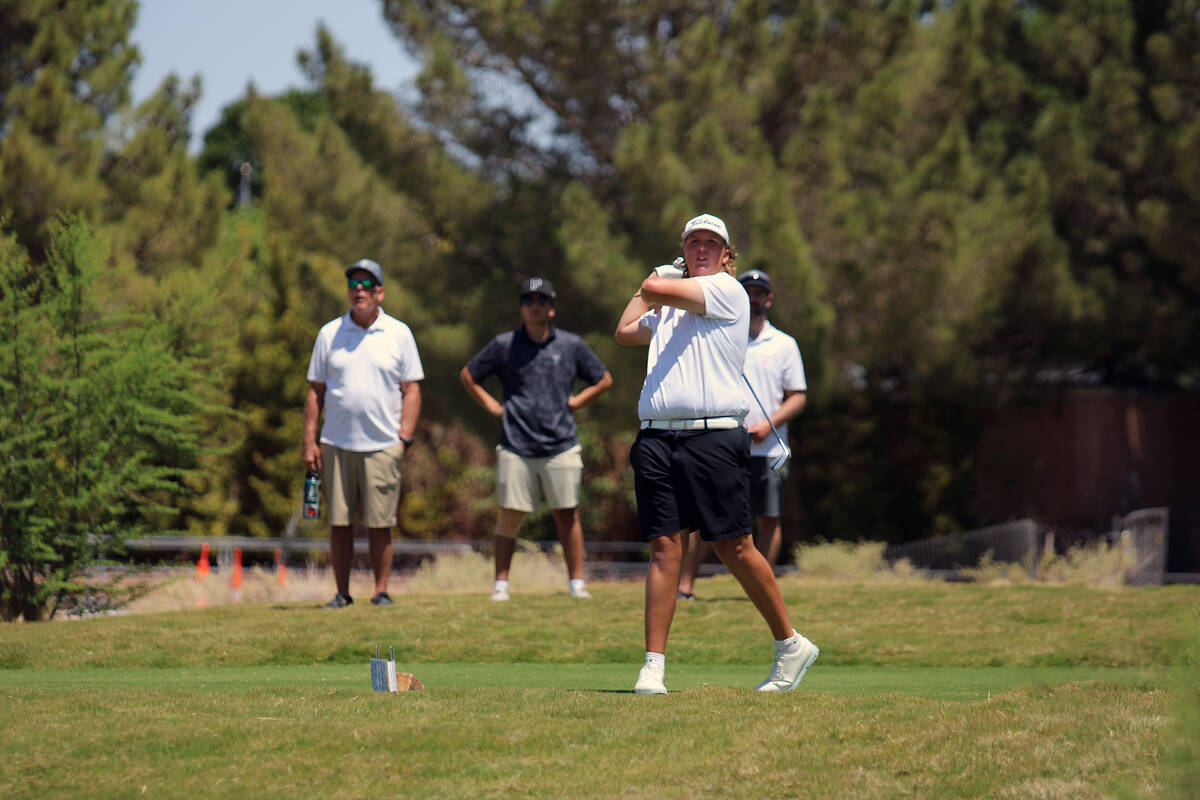 Pahrump Valley High School boys golf freshman Brody Myers tees off on Coyote Run course at Boul ...