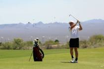 Pahrump Valley High School boys golf junior Aaron Rily tees off on Coyote Run course at Boulder ...