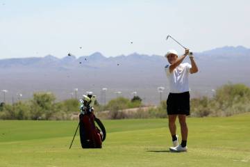 Pahrump Valley High School boys golf junior Aaron Rily tees off on Coyote Run course at Boulder ...