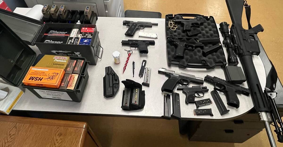 During the execution of a search warrant in Pahrump, authorities seized one rifle, seven handgu ...