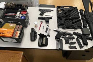 During the execution of a search warrant in Pahrump, authorities seized one rifle, seven handgu ...