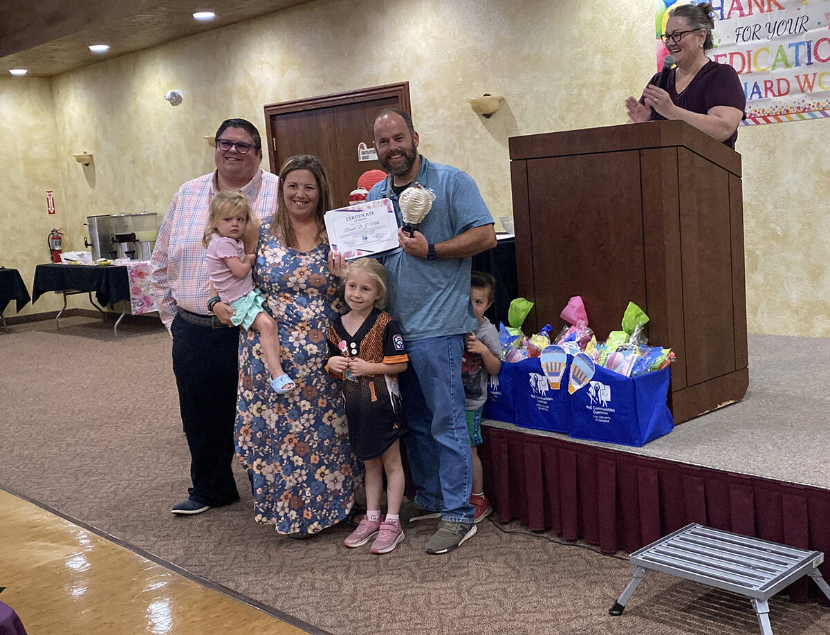 D.J. Mills, surrounded by his family and with close friend Ryan Muccio to present, took home th ...