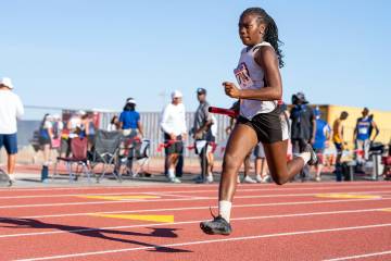 Pahrump Valley High School freshman Ma’liyah Collins runs the 4x200 during the the Class 3A S ...