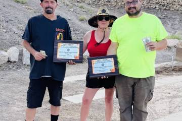Shoes $ Brews pitchers show off their winnings following a tournament last Sunday at the Arroyo ...