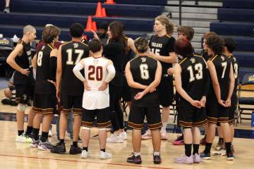 Pahrump Valley High School boys volleyball head coach Amber Lugo speaks to the team during an a ...