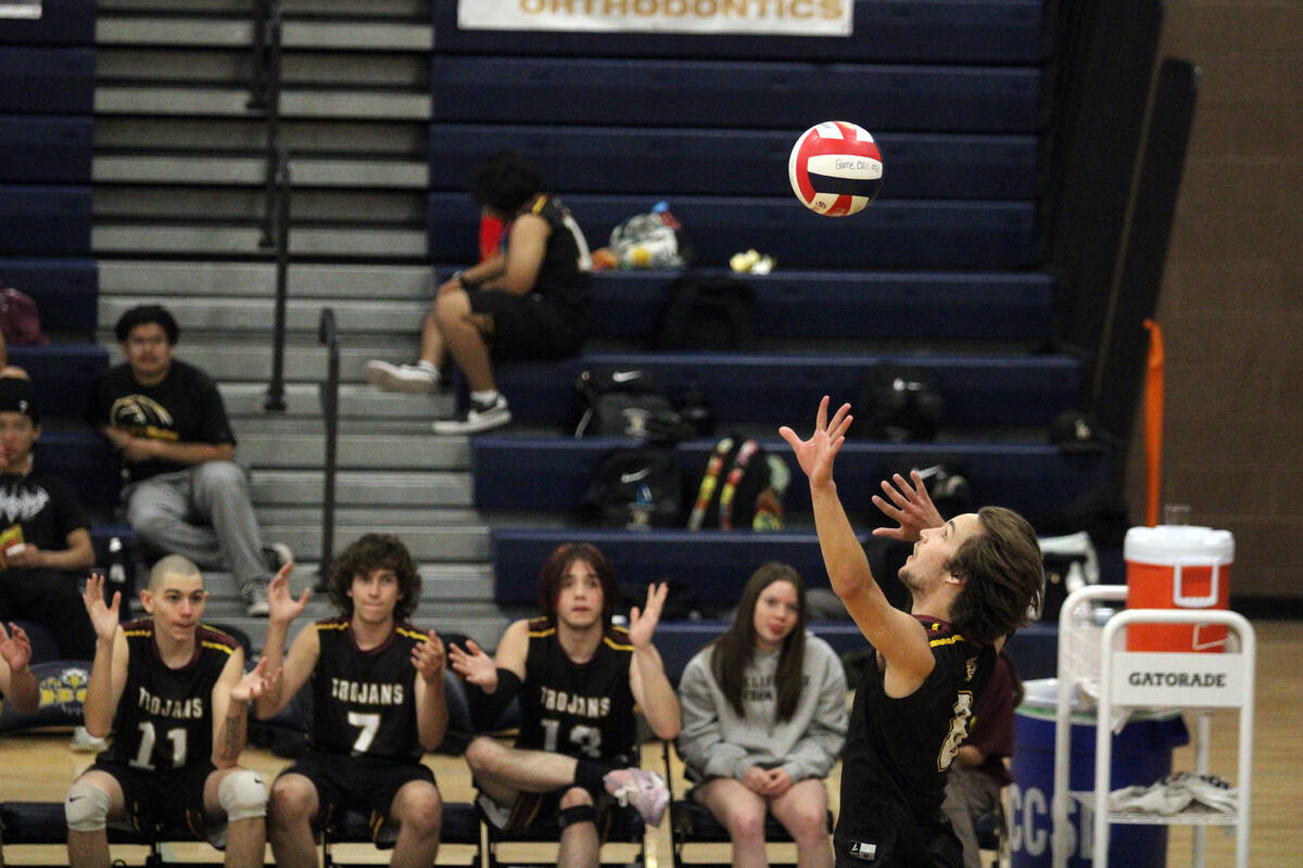 Pahrump Valley High School senior Elijah Thompson prepares to serve the ball on the road agains ...
