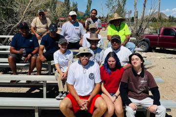 Pitchers from the Nevada State Horseshoe Pitching Association rest following the conclusion of ...