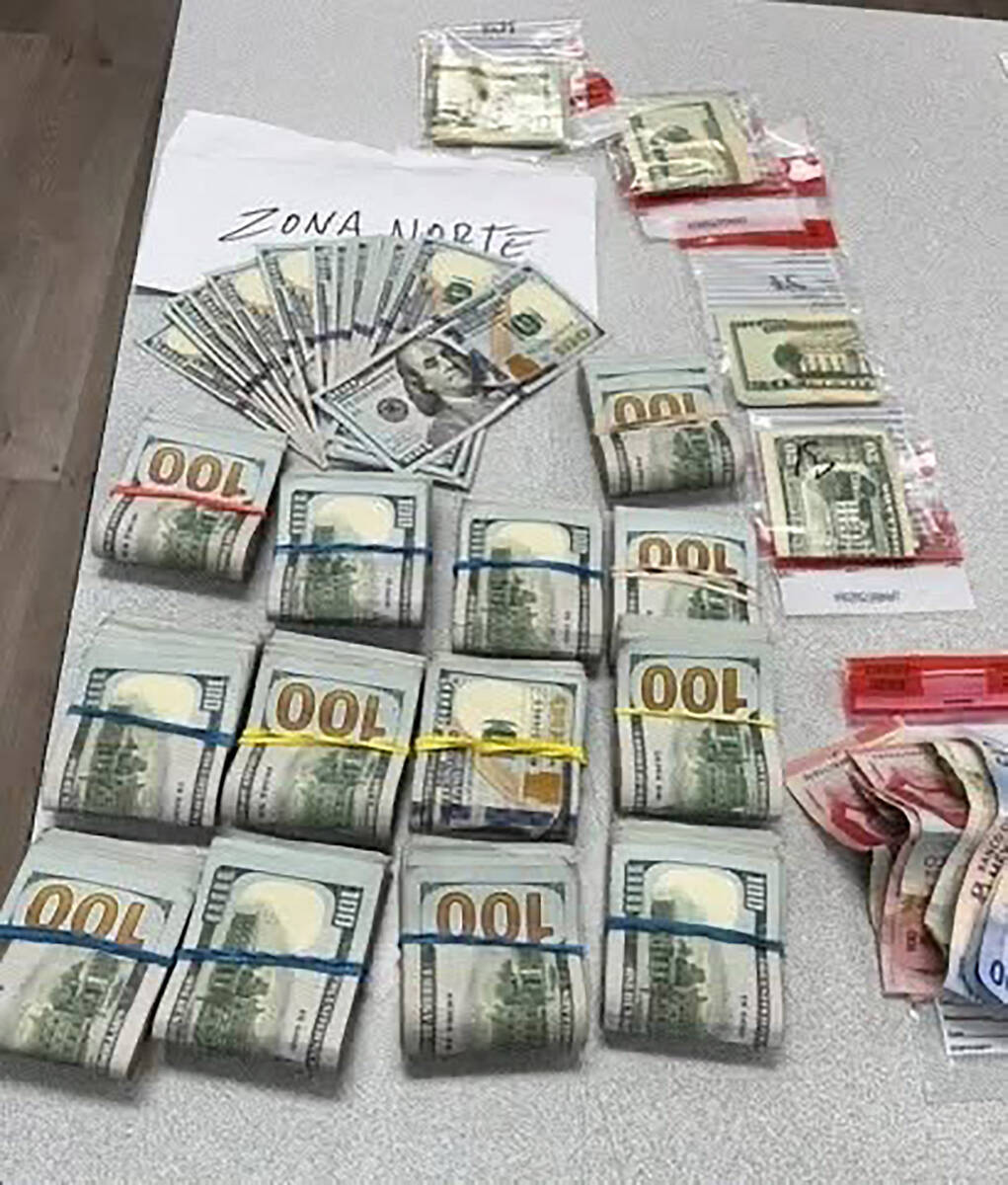 Over $60,000 in cash was seized by police in their warrant arrests connected to an alleged cock ...