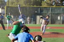 Pahrump Valley High School senior Kayne Horibe hurls a pitch toward the plate during a non-leag ...