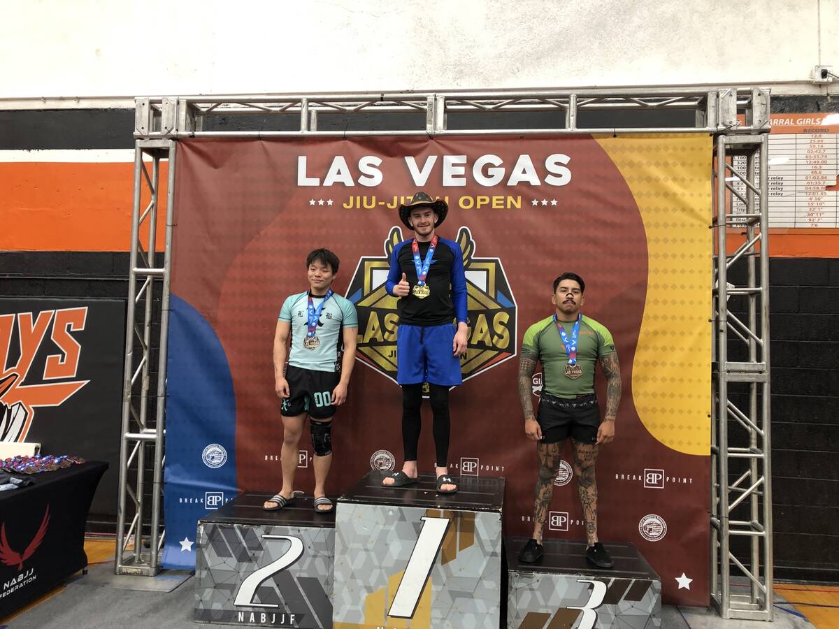 Zackery Wilson proudly stands in first place on the podium following the end of NAGA Salt Lake ...