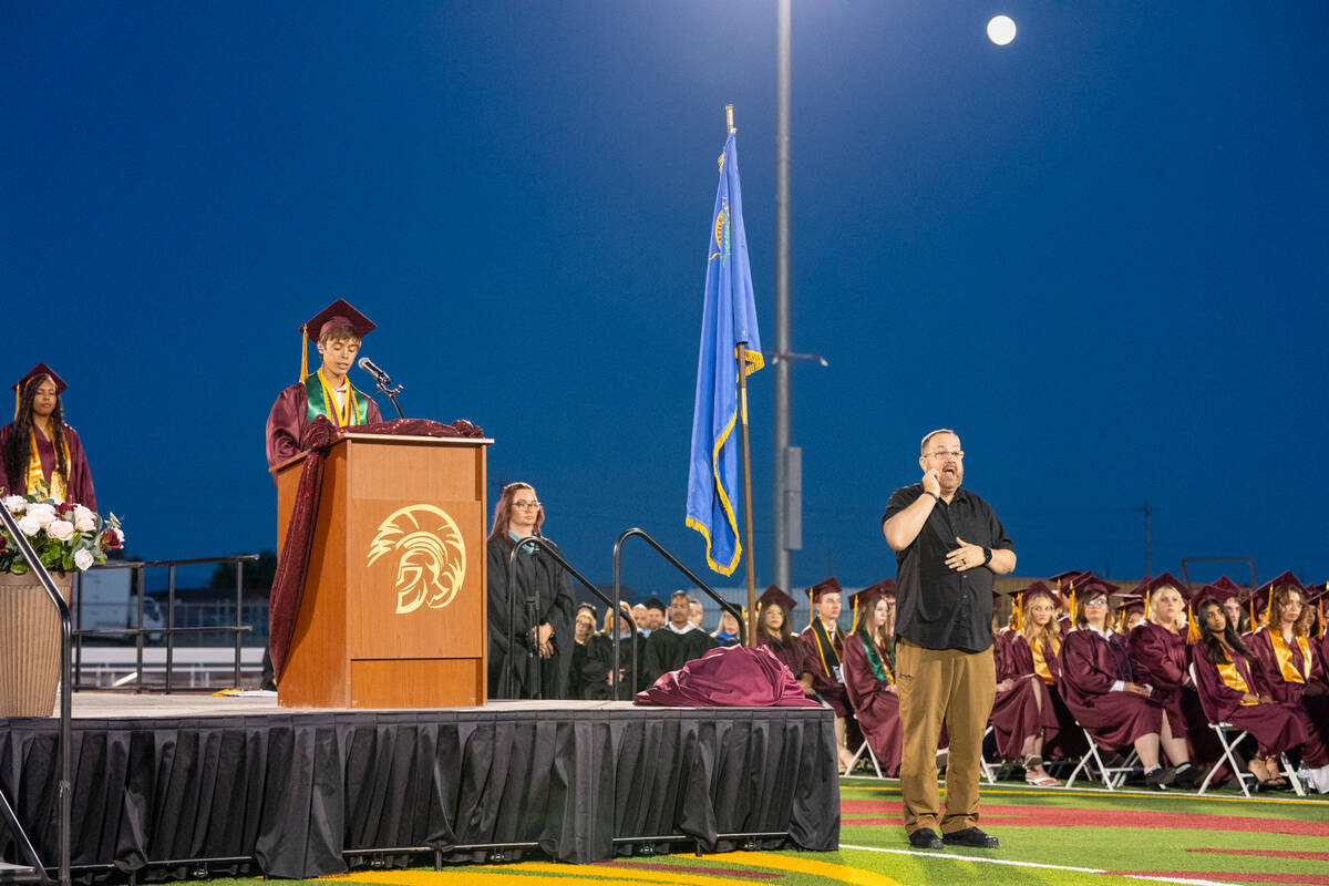 Valedictorian Timothy Stutzman delivers his speech to the graduates and families. (John Clausen ...