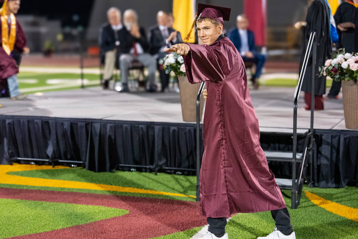 A graduate poses after receiving his diploma. (John Clausen/Pahrump Valley Times)