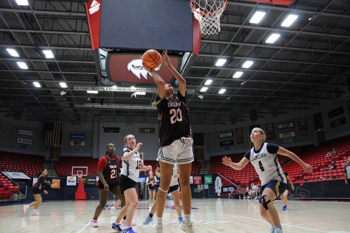 Pahrump Valley High School incoming senior Riley Saldana drives to the paint during an exhibiti ...