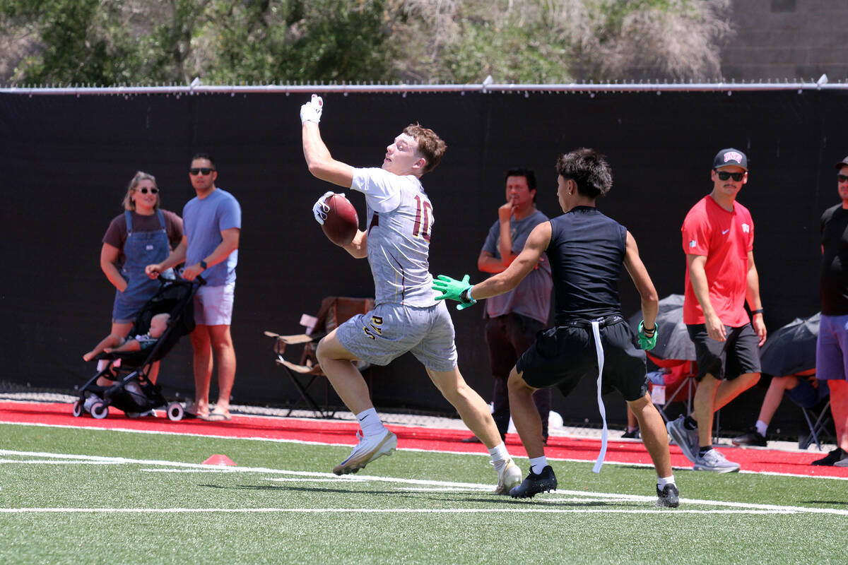 Pahrump Valley High School junior Lucas Gavenda avoids a defender during a 7-on-7 exhibition ag ...