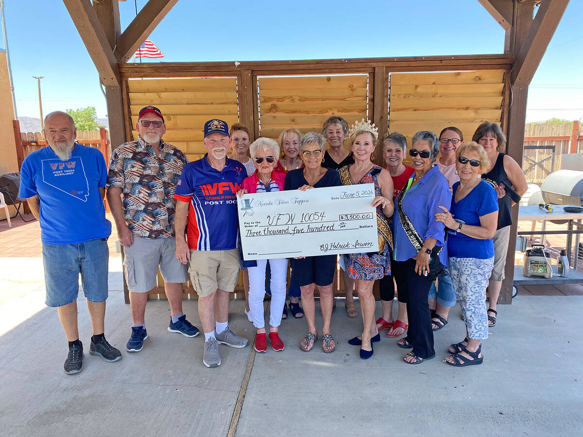 The Nevada Silver Tappers and Ms. Senior Golden Years presented a $3,500 check to the VFW Veter ...