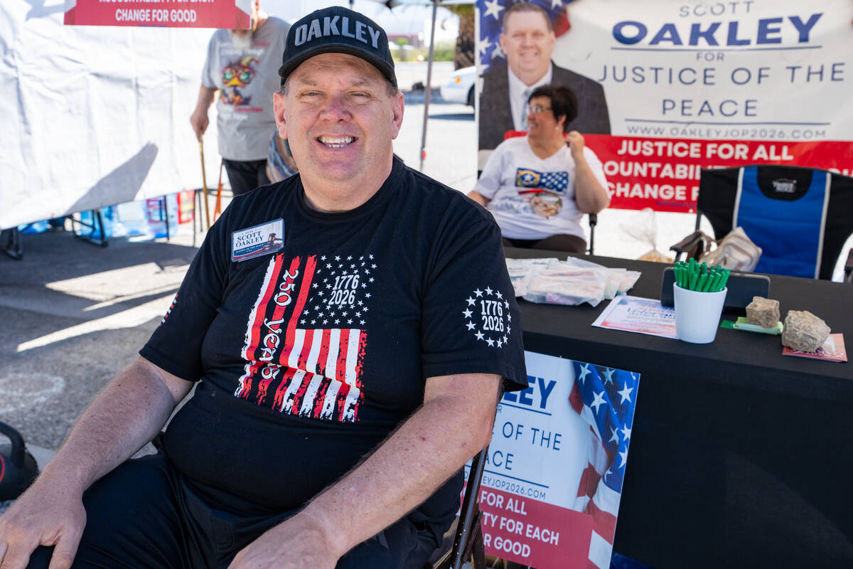 Scott Oakley, candidate for Pahrump Justice of the Peace, Dept B, greets voters on Primary Elec ...