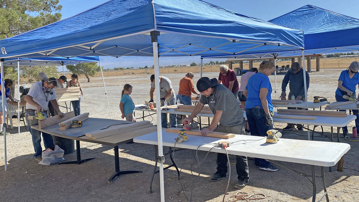 Sanding is a dusty but necessary part of any Community Bed Build and tables for that task were ...