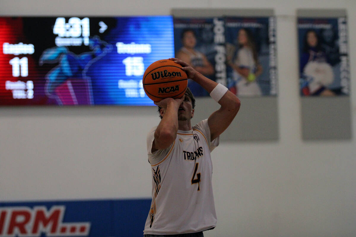 Pahrump Valley High School's Tristan Schumacher attempts to sink a free throw against Lake Mead ...