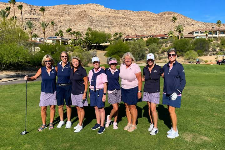 Members from the Mountain Falls Women’s Golf Association pose together following play of a to ...